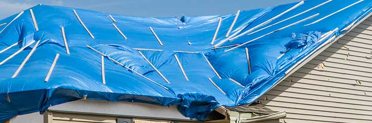 Securing your home: the importance of temporary roof tarps